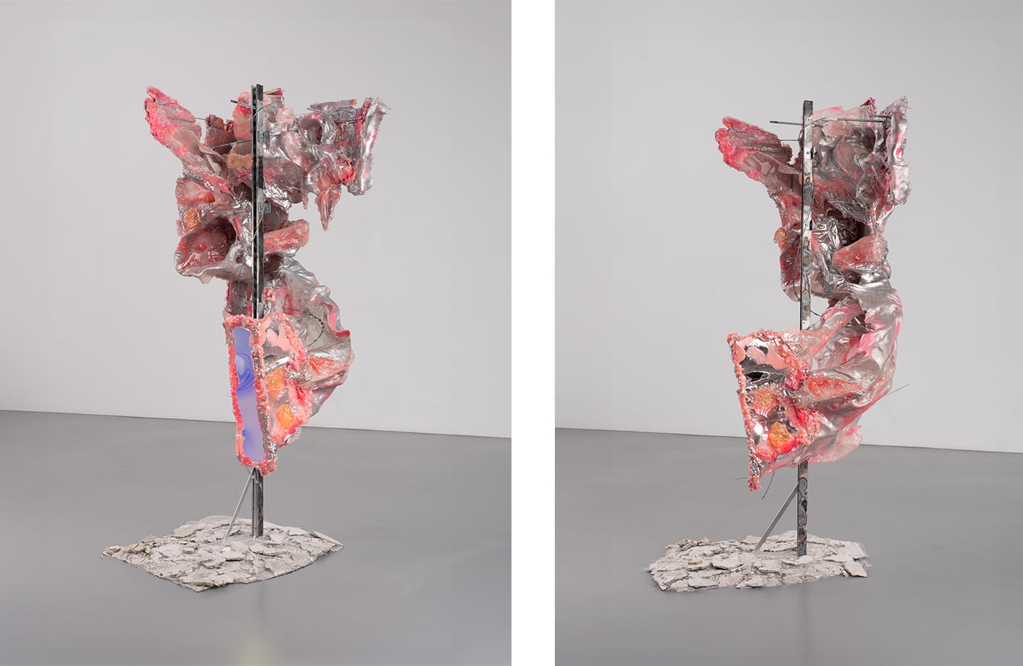 Two views of a hanging figure sculpture in pink resin and mirrored steel on a rubble base
