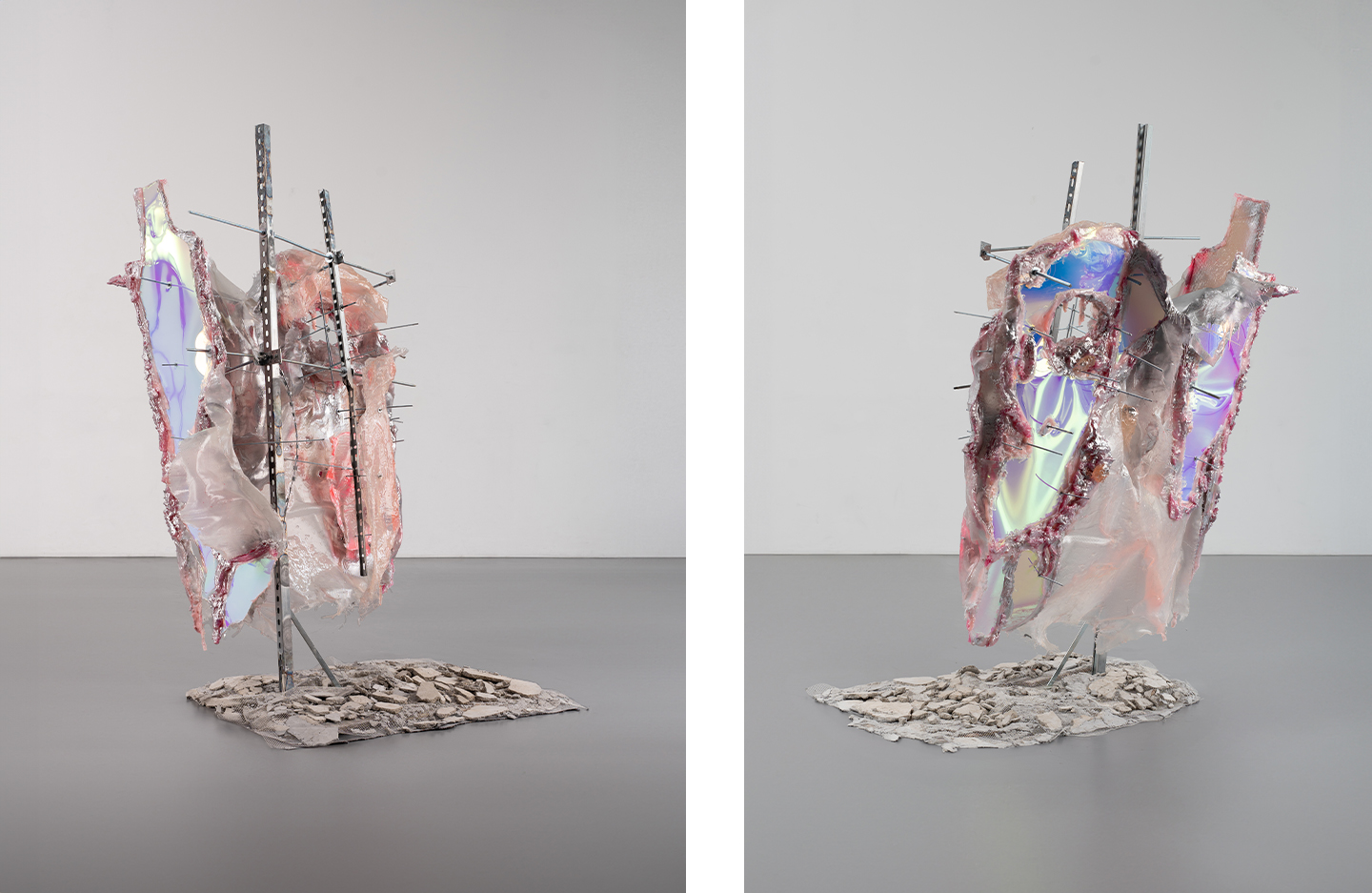 Two further views of the same sculpture, showing iridescent panels and steel armature